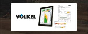 Image showing the Völkel logo next to a tablet displaying various graphs and data. In the background, there are documents with similar data visuals and a construction site with earth-moving equipment.