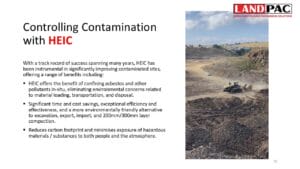 A bulldozer works at a large, open construction or landfill site under a partly cloudy sky.